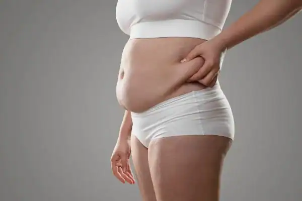 The Hidden Connection: How Stress Shapes Your Fitness and Body Composition 1 Image of stress belly Brighton How Lipo 360 can help manage your symptoms