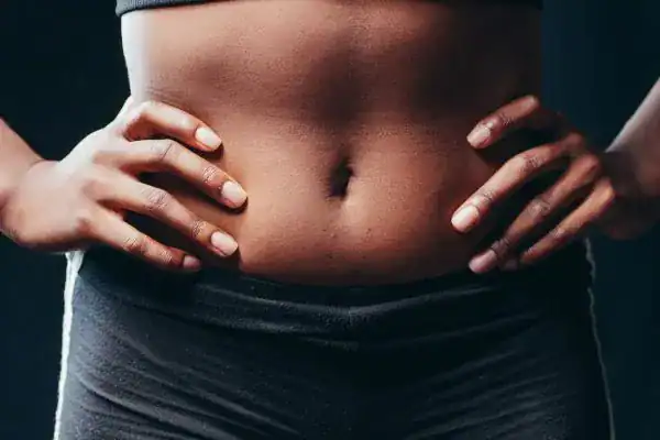 Toning Your Stomach: The Ultimate Guide to Achieving a Sculpted Stomach While Shedding Pounds 1 Image of a toned stomach after non surgical treatment Brighton